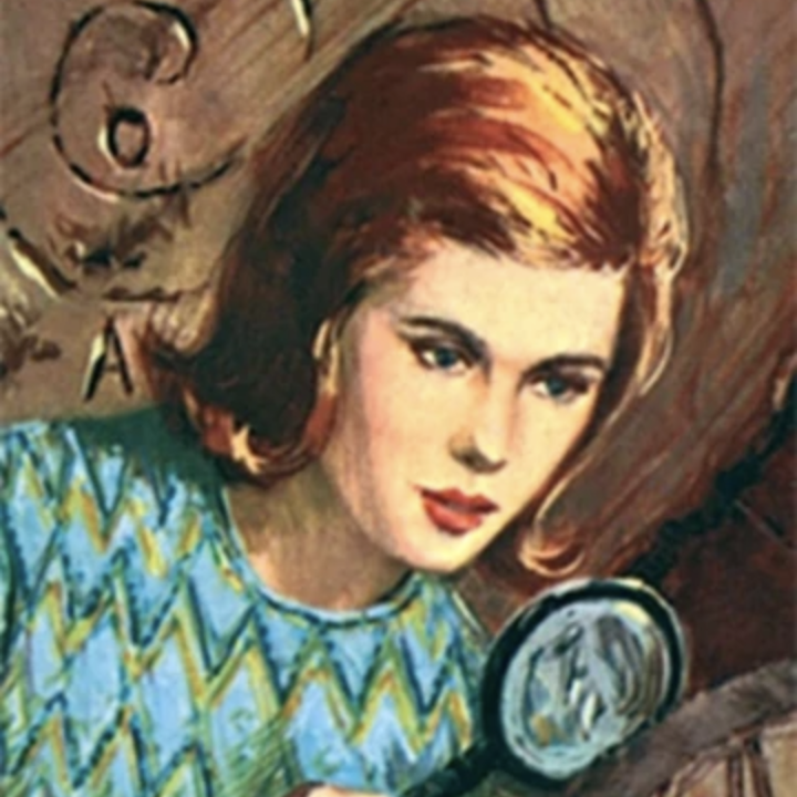 Nancy Drew holding a magnifying glass