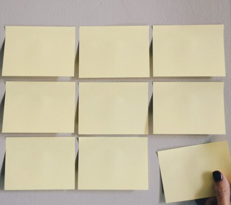 three rows of blank yellow post its