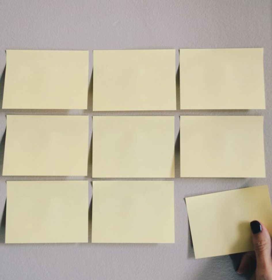 three rows of blank yellow post its